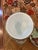 This is a vintage F.B. Rogers silver-plated ice bucket with a white glass liner. It features an ornate, scrolled handle on...