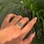 This open ring featuring a 0.67 carat pear cut natural emerald, set in 14K white gold. Each emerald measures approximately...