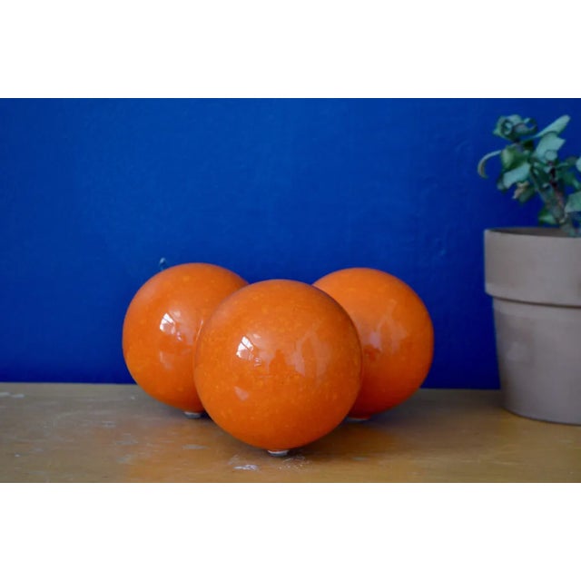 As much a useful object as an atomic sculpture, this astonishing ashtray is as colorful as it is sculptural. An assembly...