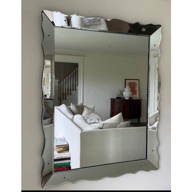 Venetian mirror with beveled detail and scalloped edges. Heavy will require two people. Local Pickup. 59 H x 47 W