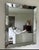 Venetian mirror with beveled detail and scalloped edges. Heavy will require two people. Local Pickup. 59 H x 47 W