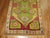 A mid 20th cenutry Turkish Konya rug featuring a bright apple green color. The medallion is a mustard, the ground is red...