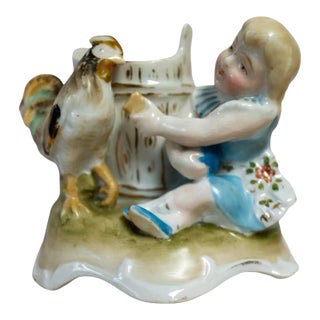 Late 19th Century Girl Feeding Chicken Porcelain Match Striker / Holder For Sale