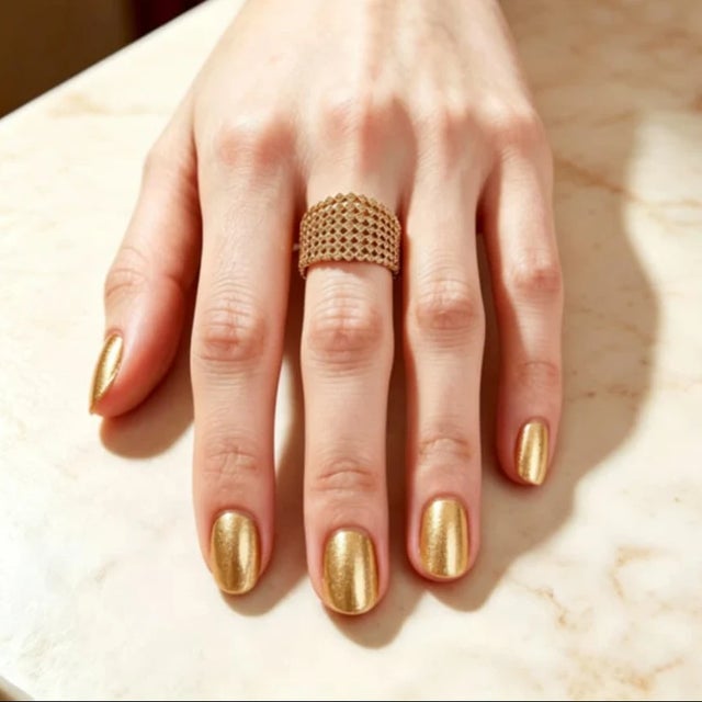 Estate designer yellow gold vermeil over 925 silver band ring featuring champagne diamonds. This striking ring is set with...