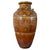 Qing Dynasty Martaban-type Glazed Earthenware Storage Jar, circa 1880-1920. This vessel has a tall, gently tapering body...