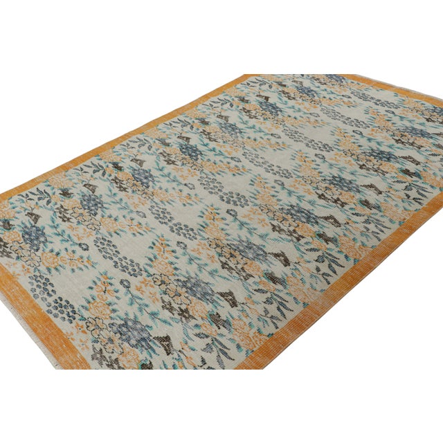 Hand-knotted in wool, circa 1960 - 1970, this 5x9 vintage Müren rug is an exciting new addition to Rug & Kilim Mid-century...