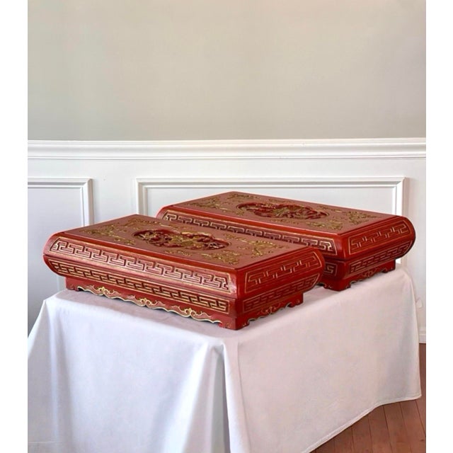 Near pair set of large Chinese carved and embossed red lacquered wooden rectangular presentation boxes with gilt...