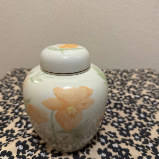 This elegant vintage ginger jar from the Crowning Touch Collection features a soft, hand-painted floral design, perfect...