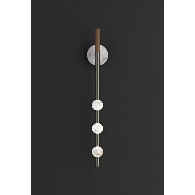 Demetra brushed black wall lamp by alabastro italiano dimensions: d 9 x w 10 x h 60 cm. Materials: white alabaster, metal...
