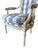 Bring effortless French charm into your home with this beautifully carved armchair, featuring an antique painted frame and...