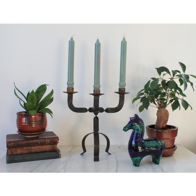 Vintage Brutalist wrought iron candelabra taper candle holder. No makers mark. Slightly crooked. Some oxidation.