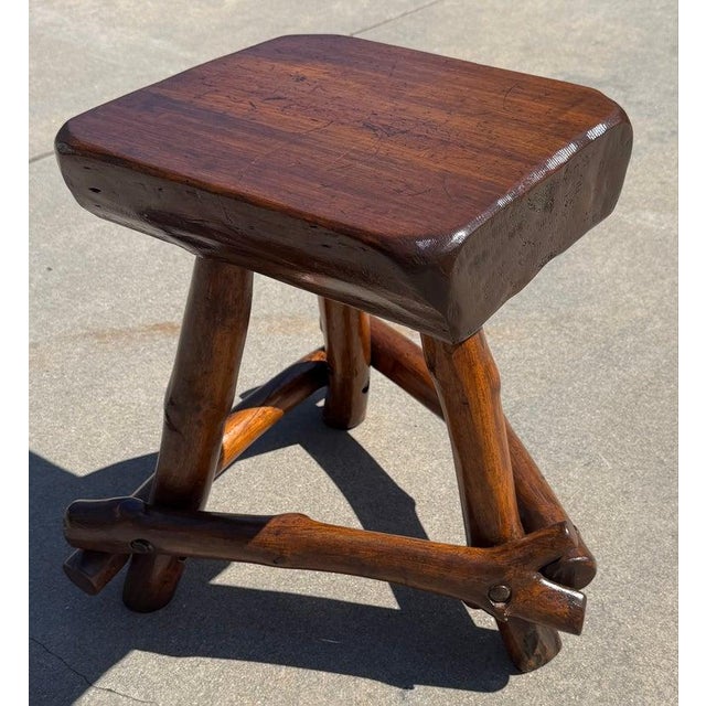 Old Hickory Plank Stool with three legs and all hand carved.This funky stool was made by a wood worker in the 1940's in...