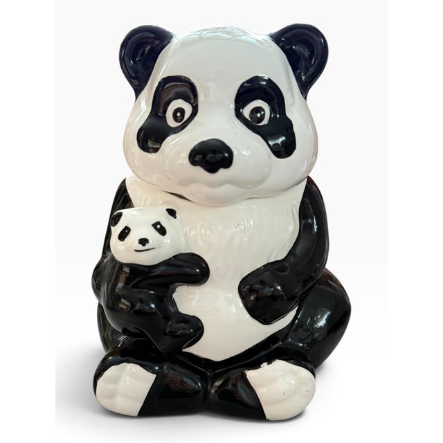 Adorable vintage ceramic panda cookie jar featuring a charming mother panda cuddling her baby in her arms. The whimsical...