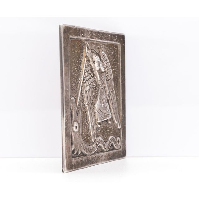 Rare sterling silver miniature wall plaque depicting St Michael. Hallmarked for Dunstan Pruden (1907-1974). London 1972....