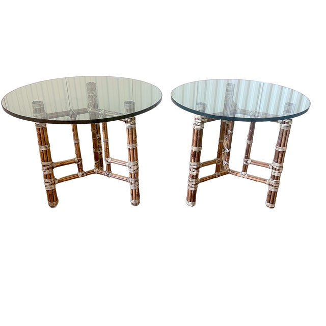 This is a very striking pair of 1970's McGuire Furniture side tables featuring the firm's iconic bamboo construction...