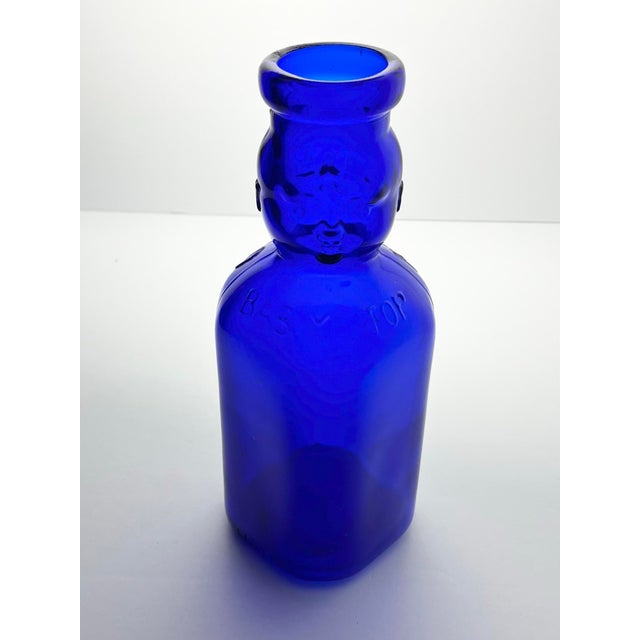 1930s Vintage Brookfield “Baby Top, Face” Cobalt Blue Glass Bottle 9.5” 1qt 32oz Good vintage condition. No chips, cracks,...