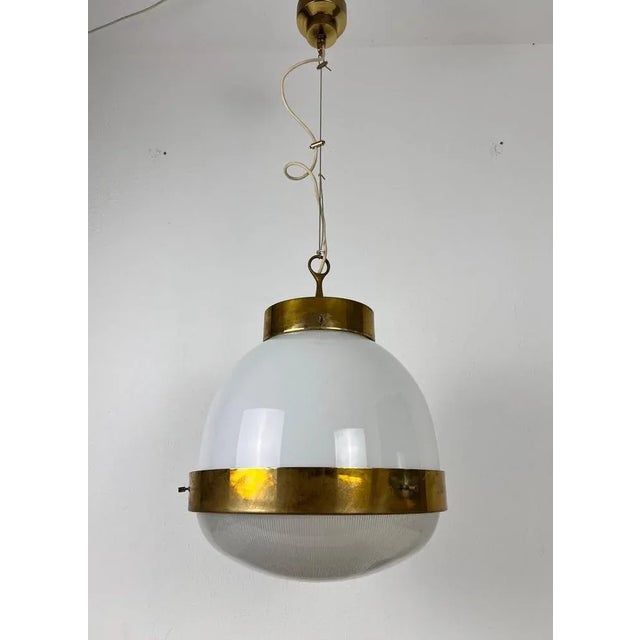 Delta chandelier by sergio mazza for artemide made in italy in the 1960s. It is fascinating with its glass shape and...