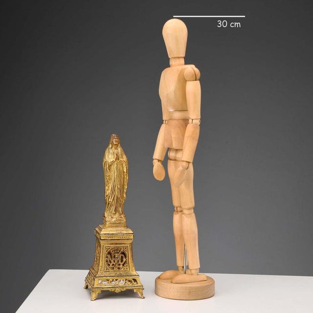 Our Lady of Lourdes in gilded metal. This piece is attributed to the mentioned designer/maker. It has no attribution mark...