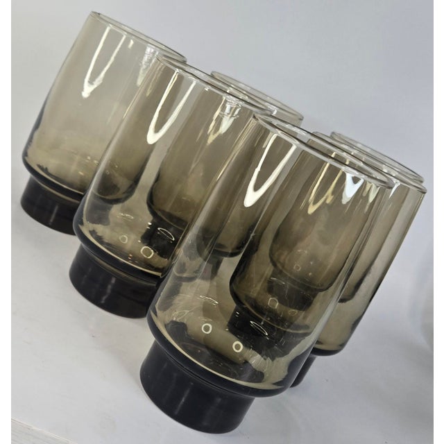 The thick, stubby bases really set the stage for the table on these tawny mid century tumblers.