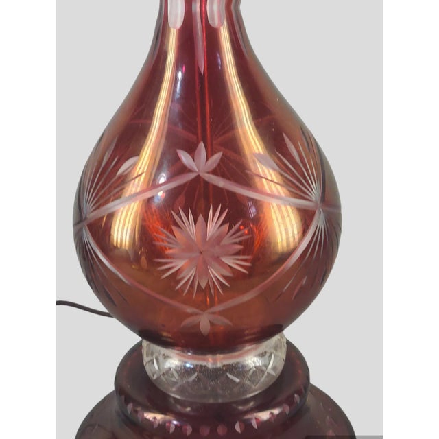 Vintage Bohemian Ruby Red cut to Clear Flush Table Banquet Lamp. Good condition, new wiring, measuring 22'' to socket 28''...