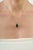 The Modernist 10.74 Ct Malachite Cabochon Solitaire Pendant features a striking 10.74-carat malachite gemstone in an...