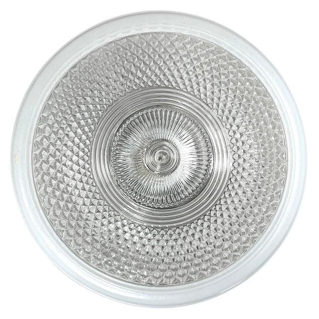 A classic American, Art Deco flush mount ceiling light fixture with a beautifully shaped pressed glass shade and original...