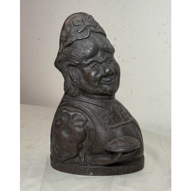 Up for sale is a rare antique 2 face "Every Copper Helps" or "I Love a Copper" cast iron still bank by British foundry...