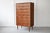 A wonderfully handsome Danish tallboy chest of drawers, produced in the 1960's by Steens of Denmark. In a generous size...