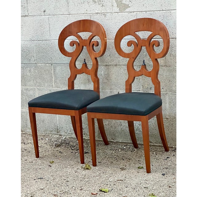 Beautifully made pair of walnut veneer Biedermeier style chairs with dramatic, balloon-shaped pierced splat sculpted with...