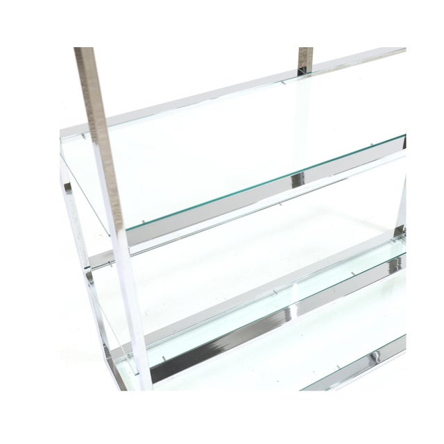 Contemporary, one part form with seven glass shelves, unmarked. 78 x 42 x 16 in.
