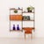 This elegant teak shelving system, designed by kai kristiansen, will create a functional and stylish working space for a...