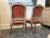 A pair of beautiful pink velvet upholstered chairs in the style of 18th century Louis XV chairs with cabriole legs. The...