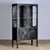 Made of steel and glass that is clamped in the steel by a rubber strip. The cabinet is from the 1970s and was produced in...