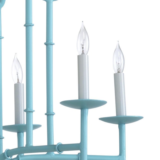 Blue sky finish on iron. Comes ready to hang with a 5" canopy and 76" chain. 28h x 27w x 27d