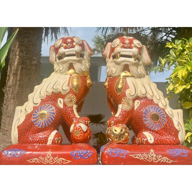 Foo dogs are believed to bring balance and enhance positive energy when positioned correctly. Crafted in Kutani ware...