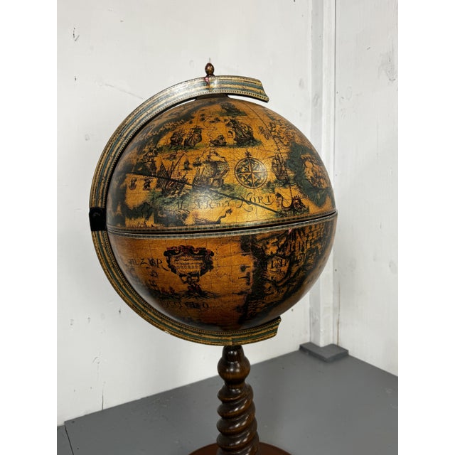 A beautiful decorative large globe bar in a classic style, perfect for adding character to any space. The sphere,...