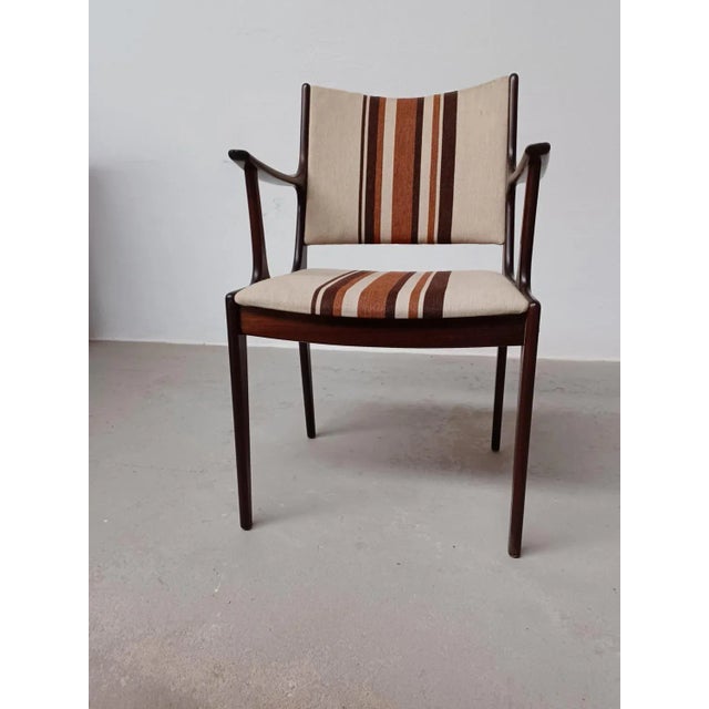 Fully restored customized Johannes Andersen mahogany armchairs The armchairs feature a clean simple yet elegant design...