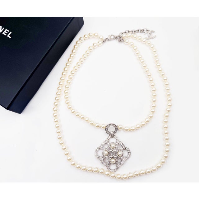 Chanel Silver Argyle Crystal Pendant 2 Strand Pearl Necklace *Marked 16 *Made in Italy *Comes with the original box and...