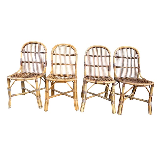 Beautiful set of 4 rattan chairs from the 1960s. Handcrafted in the south of France.