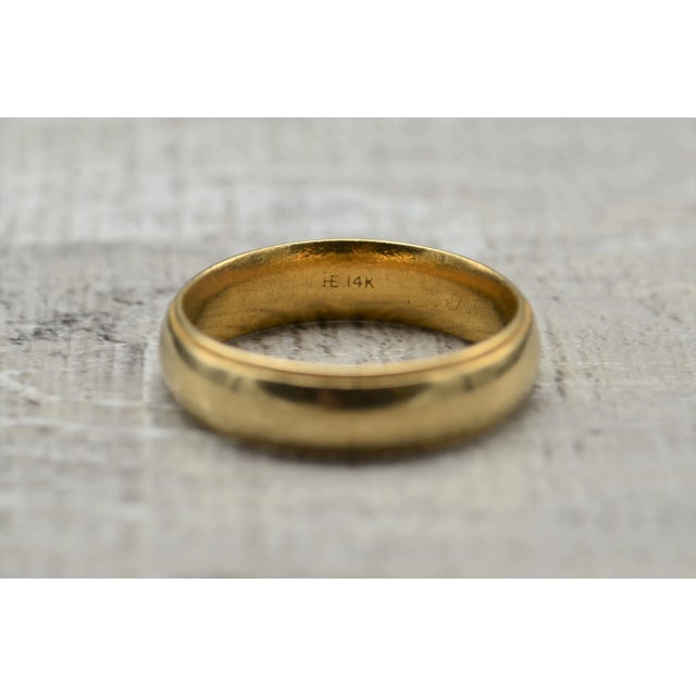 The Hammamet Men's 14K Yellow Gold Classic Men's Wedding Band. This classic styled men's band features a slightly domed...