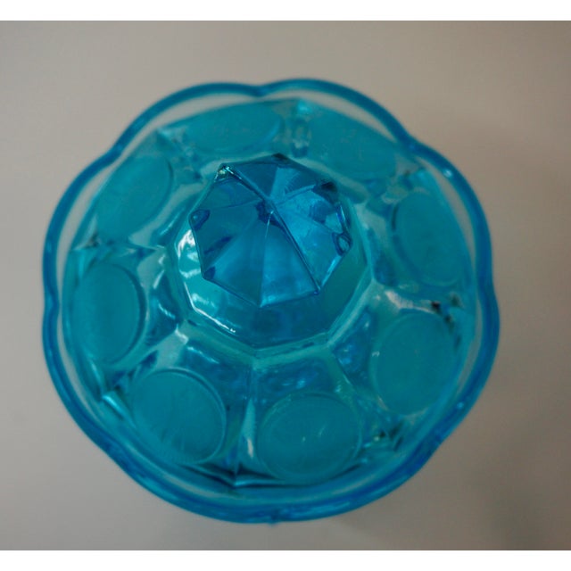 A stunning mid-century statement piece, this authentic Fostoria Glass pedestal candy dish (or wedding bowl) is a...