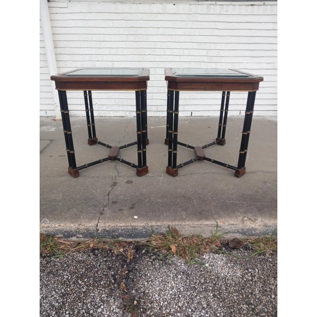 The Pair of Faux Bamboo John Widdicomb End Tables is a stylish and versatile addition to any living space, embodying a...