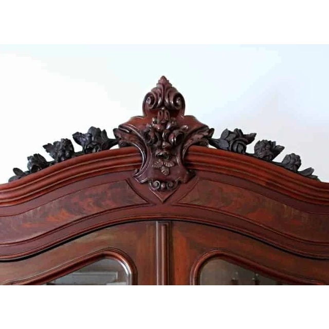 Large bookcase with fine hand carving. Mahogany. Partially restored - ready for use. Very solid construction. No...