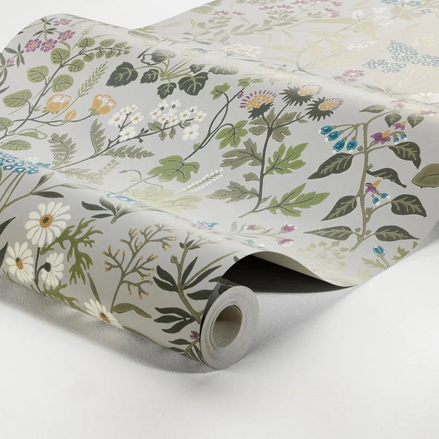 Flora, a wallcovering by Boråstapeter, portrays a sumptuous riot of peak-season blossoms. The print is filled with...