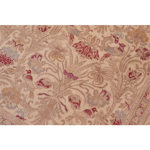 Designed with mesmerizing intricacy and gorgeous color palette, this hand-knotted masterpiece demonstrates the beauty and...
