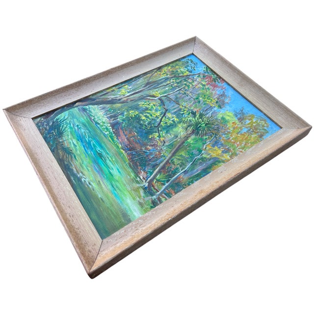 A vibrant vintage Florida landscape painting depicting a spring set in tranquil wooded scene with reflective water,...