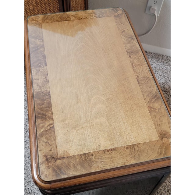 I love this chest of drawers because of the contrast of the black lacquer look with burl wood. It's very sturdy and gives...