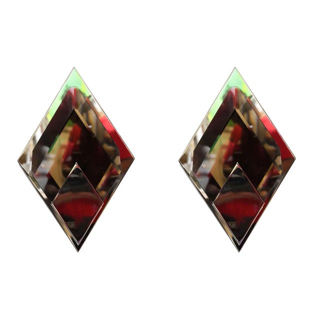 Elevate your mid-century modern interior with the Donghia Bijou Wall Sconces in Nickel and Smoked Murano Glass, now...