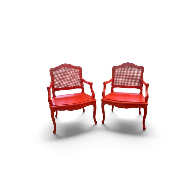 18th Century Fauteuils in Hollywood Regency Coral a Pair . Beautiful carving and perfect cane backs on both chairs ....