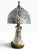 Elegant vintage cut-glass boudoir table lamp featuring an intricately patterned clear glass body and matching domed glass...